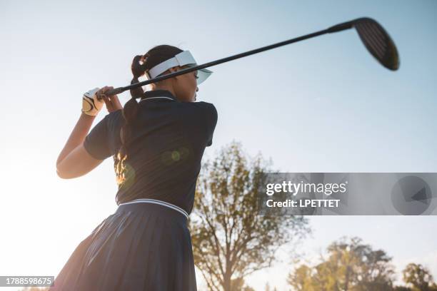 golfing - golf swing stock pictures, royalty-free photos & images