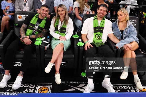 Michael Zerafa, Matt Zukowski and Tammy Hembrow attend the round seven NBL match between South East Melbourne Phoenix and Melbourne United at John...