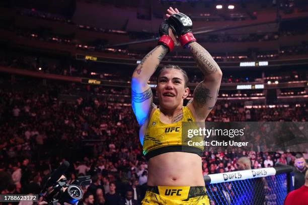 Jessica Andrade of Brazil celebrates defeating Mackenzie Dern by TKO in a strawweight fight during the UFC 295 event at Madison Square Garden on...
