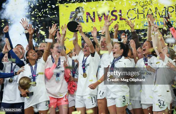 Ali Krieger of NJ/NY Gotham FC raises the NWSL Championship trophy after defeating the OL Reign during the 2023 NWSL Championship game at Snapdragon...