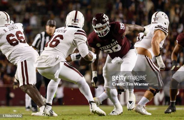 Gabriel Brownlow-Dindy of the Texas A&M Aggies pressures Chris Parson of the Mississippi State Bulldogs in the second half at Kyle Field on November...
