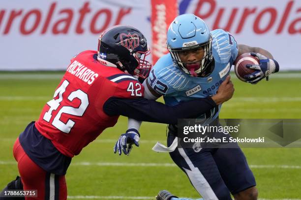 Tyrell Richards of the Montreal Alouettes tries to tackle Javon Leake of the Toronto Argonauts on a kickoff return at BMO Field on November 11, 2023...