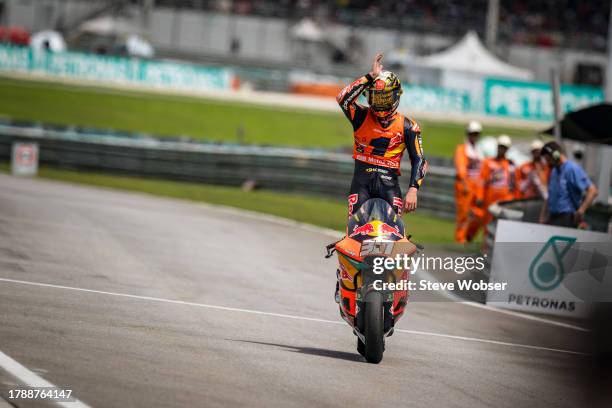Moto2 rider Pedro Acosta of Spain and Red Bull KTM Ajo enters the pitlane as new Moto2 world champion during the Race of the MotoGP PETRONAS Grand...