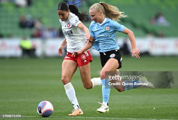 Madison McComasky of the Wanderers and Holly McNamara of Melbourne City compete for the ball during the A-League Women round four match between...