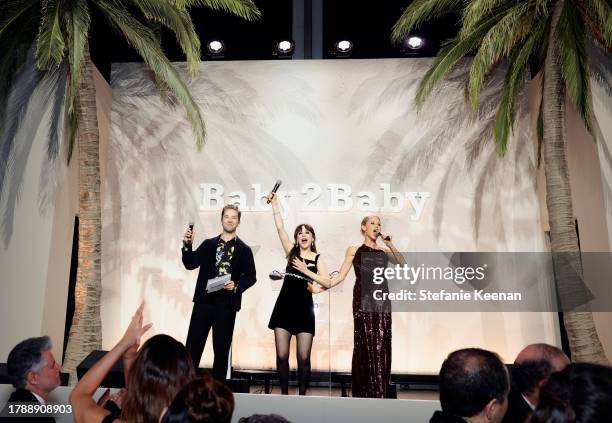 Robbie Gordy, Zooey Deschanel and Julie Bowen speak onstage during 2023 Baby2Baby Gala Presented By Paul Mitchell at Pacific Design Center on...