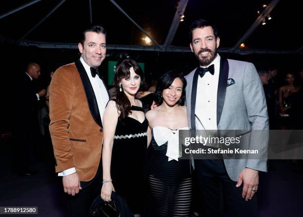 Jonathan Scott, Zooey Deschanel, Linda Phan, and Drew Scott attend 2023 Baby2Baby Gala Presented By Paul Mitchell at Pacific Design Center on...