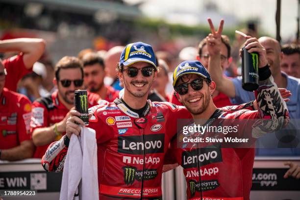 Francesco Bagnaia of Italy and Ducati Lenovo Team celebrates with Enea Bastianini of Italy and Ducati Lenovo Team the double podium for the team...