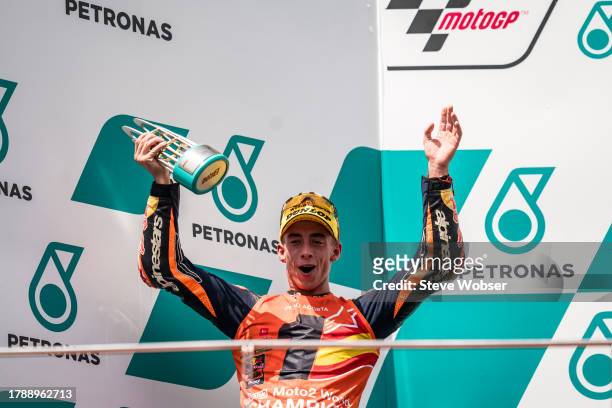 Moto2 rider Pedro Acosta of Spain and Red Bull KTM Ajo celebrats his second position and the title win on the podium during the Race of the MotoGP...