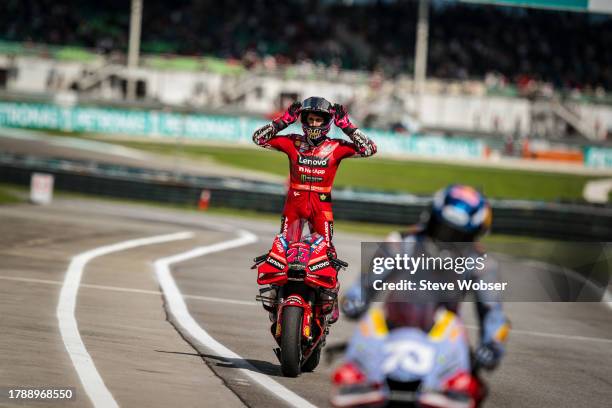 Enea Bastianini of Italy and Ducati Lenovo Team enters the parc ferme after he won the race during the Race of the MotoGP PETRONAS Grand Prix at...