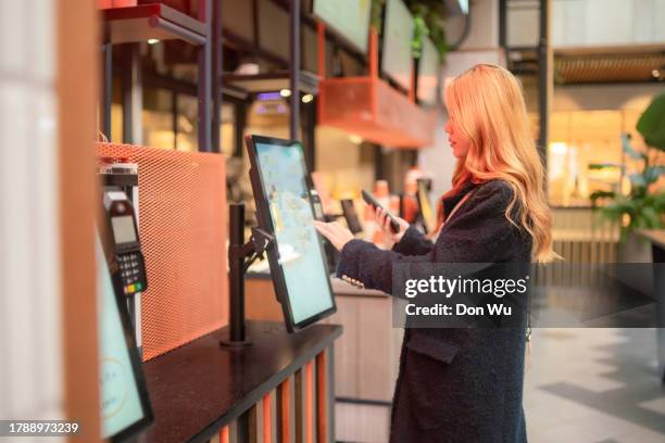 using self service touch screen - self service stock pictures, royalty-free photos & images