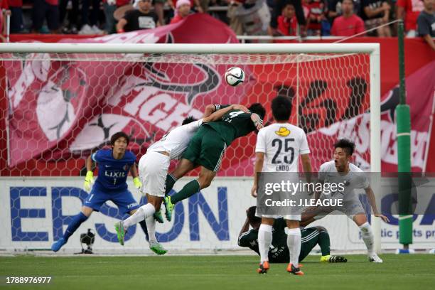 Masaki Iida of Matsumoto Yamaga heads to score the team's second goal during the J.League J1 second stage match between Matsumoto Yamaga and Kashima...