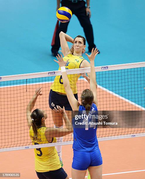Thaisa Menezes of Brazil spikes the ball during day four of the FIVB World Grand Prix Sapporo 2013 match between Brazil and Serbia at Hokkaido...