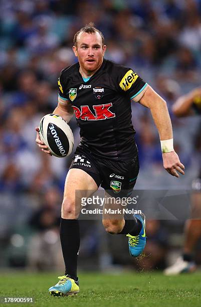 Luke Walsh of the Panthers in action during the round 25 NRL match between the Canterbury Bulldogs and the Penrith Panthers at ANZ Stadium on August...