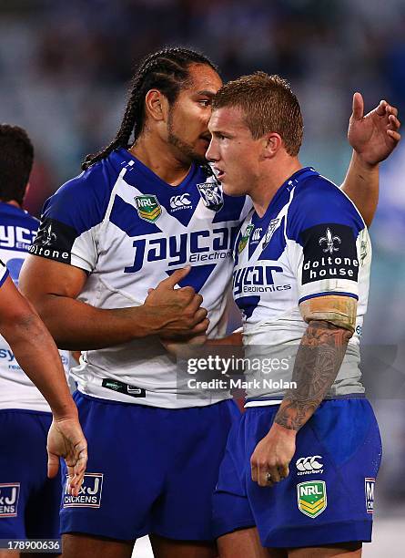 Trent Hodkinson of the Bulldogs is congratulated after scoring during the round 25 NRL match between the Canterbury Bulldogs and the Penrith Panthers...