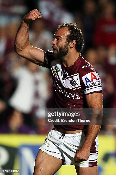 Brett Stewart of the Sea Eagles celebrates after scoring during the round 25 NRL match between the Manly Sea Eagles and the Melbourne Storm at...