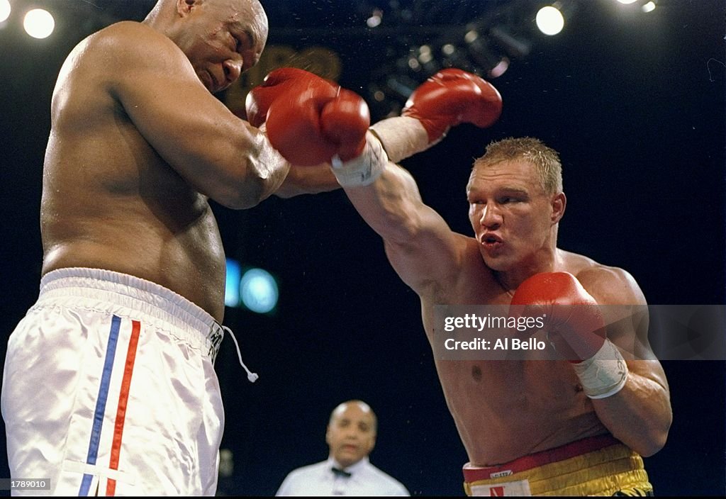 Axel Shultz Axel Shultz throws a punch at George Foreman during a fight in Las ...