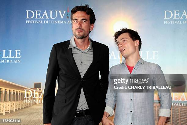 French film director Alexandre Moors and scenarist Ronnie Porto pose during a photocall to present the film "Blue Caprice" as part of the 39th...
