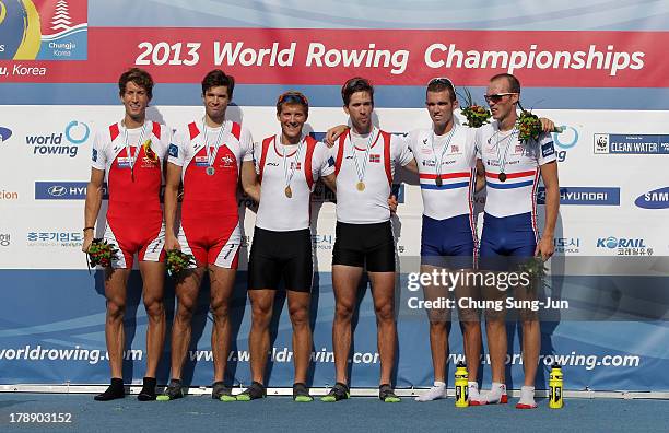 Richard Chambers and Peter Chambers of Great Britain , Simon Schuerch and Mario Gyr of Switzerland , Kristoffer Brun and Are Strandli of Norway pose...