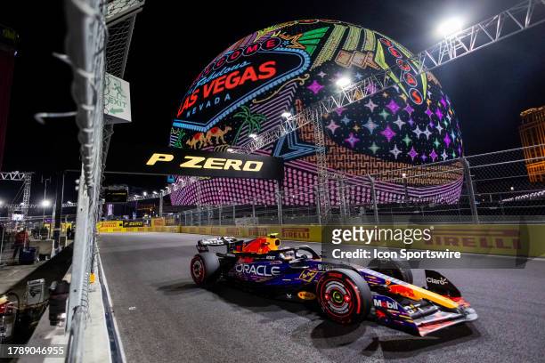 Red Bull Racing driver Sergio Perez of Mexico drives past the Sphere during P3 practice at the F1 Las Vegas Grand Prix on Thursday, November 17, 2023...
