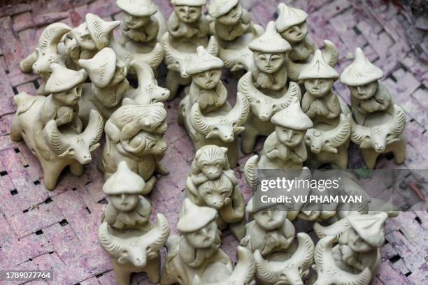 drying before firing the clay toy whistles in human and animal figurines - choice music group stock pictures, royalty-free photos & images