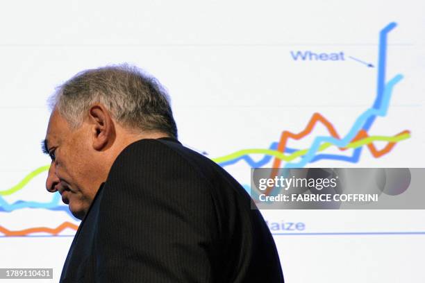 Managing director of the International Monetary Fund Dominique Strauss-Kahn walks on the stage during a session at the World Economic Forum in Davos...