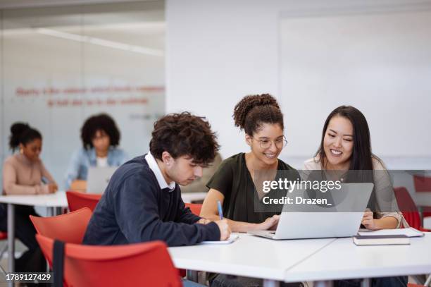 university students in classroom developing new scientific project. students talking to female african professor during or after the lectures - student advisor stock pictures, royalty-free photos & images