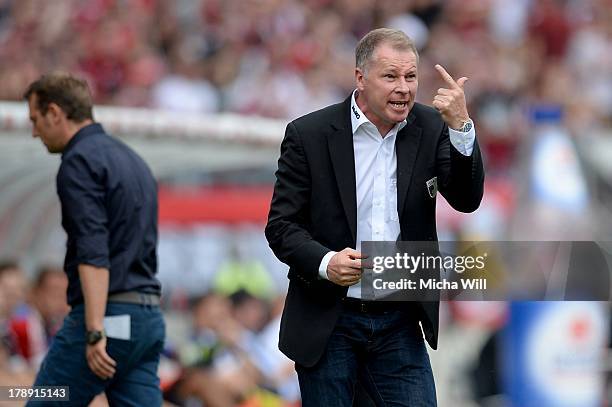 Head coach Stefan Reuter of Augsburg reacts during the Bundesliga match between 1. FC Nuernberg and FC Augsburg at Grundig Stadium on August 31, 2013...