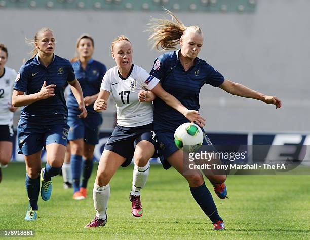 Bethany Mead of England and Charlotte Saint Sans Levacher of France battle for the ball during the UEFA European Women's U19 Championship Final match...