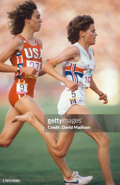 Mary Decker and Zola Budd run the Women's 3000 meter final of the 1984 Olympics held in the Los Angeles Memorial Coliseum in Los Angeles, California...
