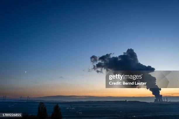 Water vapour rises from cooling towers of the Weisweiler coal-fired power plant on November 17, 2023 near Eschweiler, Germany. Demands are rising...