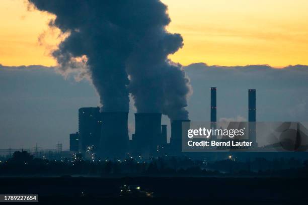 Water vapour rises from cooling towers of the Weisweiler coal-fired power plant on November 17, 2023 near Eschweiler, Germany. Demands are rising...