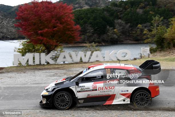 Takamoto Katsuta of Japan and his co-driver Aaron Johnston of Ireland drive their Toyota GR Yaris Rally1 Hybrid at the SS14 Lake Mikawako section of...