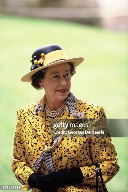 Queen Elizabeth II attends the wedding of James Ogilvy and Julia Rawlinson at St. Mary The Virgin Church on July 30, 1988 in Saffron Walden, England.