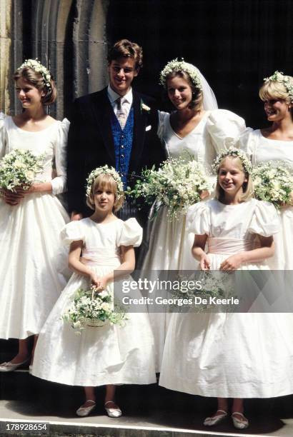 Bride and groom Julia Rawlinson and James Ogilvy pose with their bridesmaids Charlotte Rawlinson, Lady Gabriella Windsor, Alexandra Wilson And...