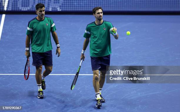 Maximo Gonzalez of Argentina and Andres Molteni of Argentina against Austin Krajicek of the United States and Ivan Dodig of Croatia in their doubles...