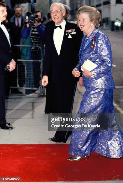 Margaret Thatcher and her husband Denis Thatcher attend the State Banquet given by Former Polish President Lech Walesa in honor of the Queen on April...