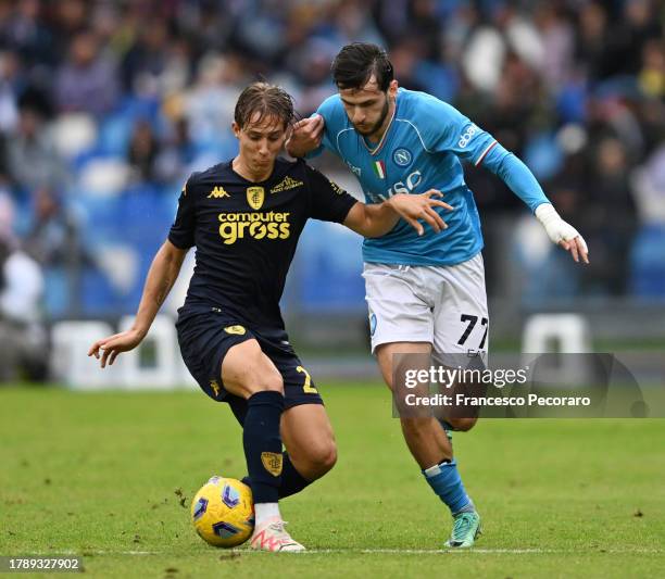 Jacopo Fazzini of Empoli FC challenges for the ball with nap77during the Serie A TIM match between SSC Napoli and Empoli FC at Stadio Diego Armando...