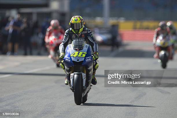 Valentino Rossi of Italy and Yamaha Factory Racing starts from box during the MotoGp Of Great Britain - Qualifying at Silverstone Circuit on August...