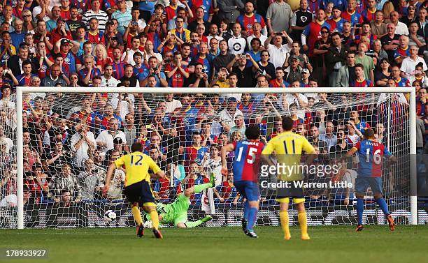 Dwight Gayle of Crystal Palace scores his penalty during the Barclays Premier League match between Crystal Palace and Sunderland at Selhurst Park on...