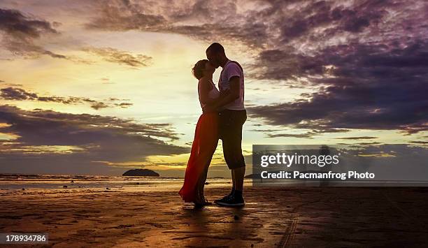 tanjung aru - kissing mouth stock pictures, royalty-free photos & images