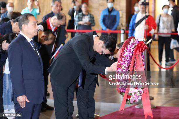 Chairman of the Chinese Kuomintang party Eric Chu and New Taipei Mayor Hou You-yi attend a ceremony to commemorate the 157th anniversary of the birth...