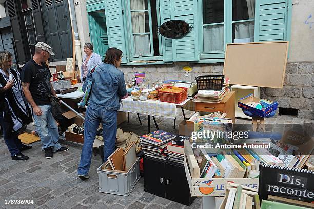 People look at items on sale during the annual Braderie de Lille on August 31, 2013 in Lille, France. The Braderie de Lille is one of the largest...