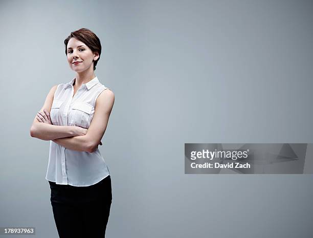 young businesswoman, portrait - three quarter length stockfoto's en -beelden