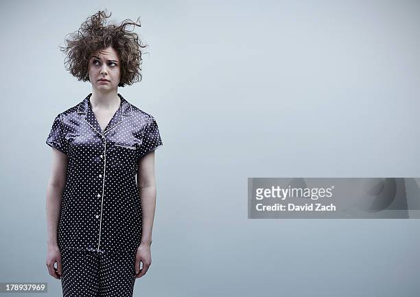 young woman in pajamas, portrait - confusion bildbanksfoton och bilder