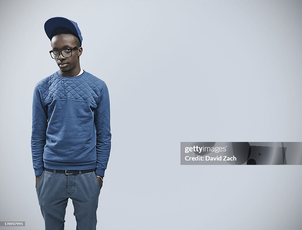 Young man with baseball cap, portrait