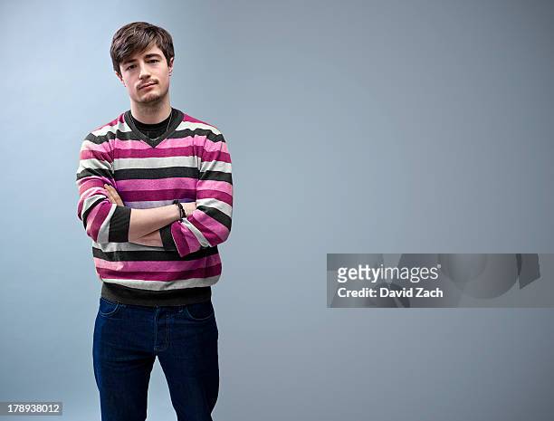 young man with arms folded, portrait - bores stock pictures, royalty-free photos & images
