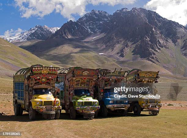 Colorful trucks at the Shandur Pass in the Hindu Kush of Pakistan