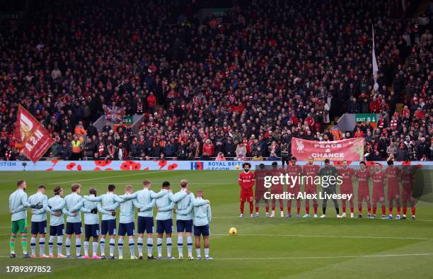 Liverpool and Brentford players and fans observe a minute of silence in honour of Armistice Day prior to the Premier League match between Liverpool...