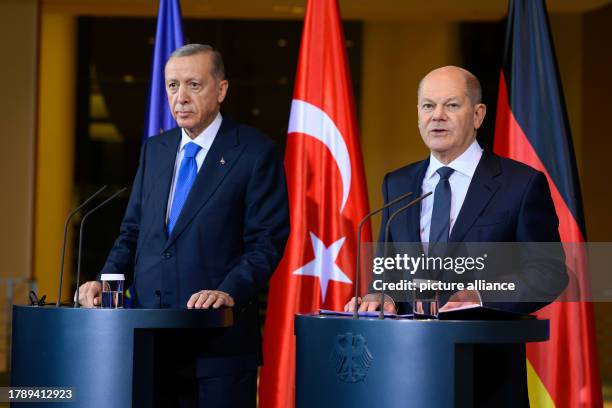 November 2023, Berlín: German Chancellor Olaf Scholz holds a press conference with Turkish President Recep Tayyip Erdogan after a dinner between the...