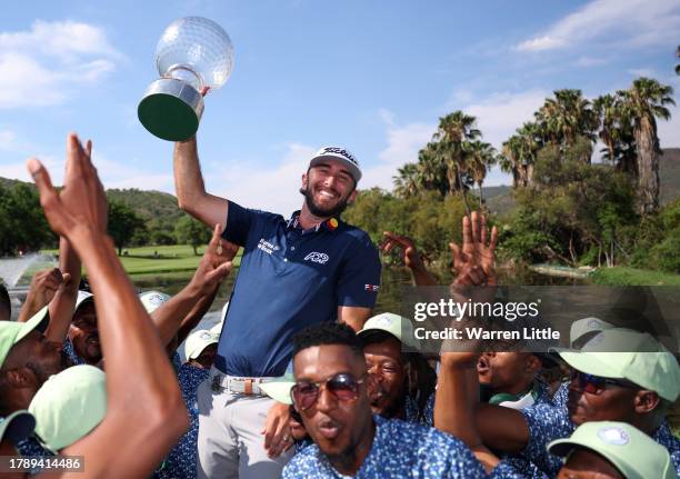 Max Homa of the United States celebrates as he is carried on the shoulders of the green keepers after winning the tournament during the final round...